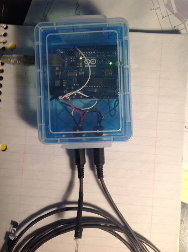 The project box with Arduino and jacks. The two probes are shown plugged in.